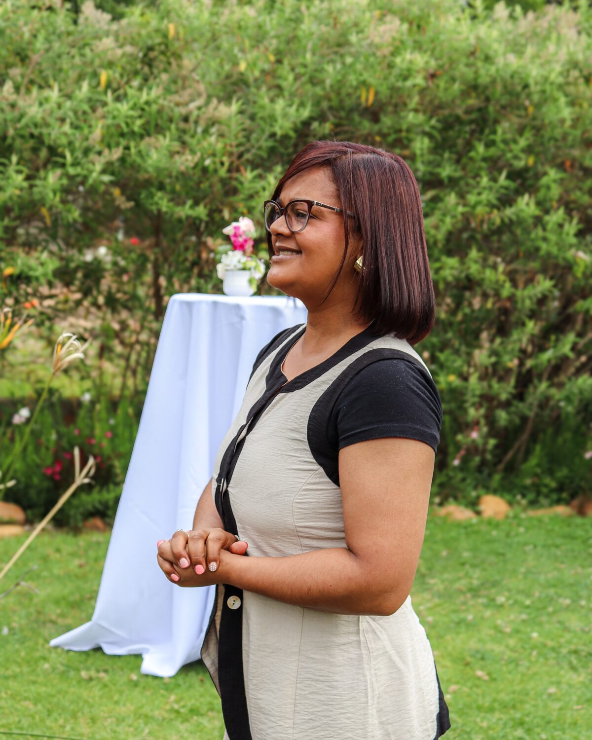 Leandie O&rsquo;Brien, founder of Creations, smiling in a garden